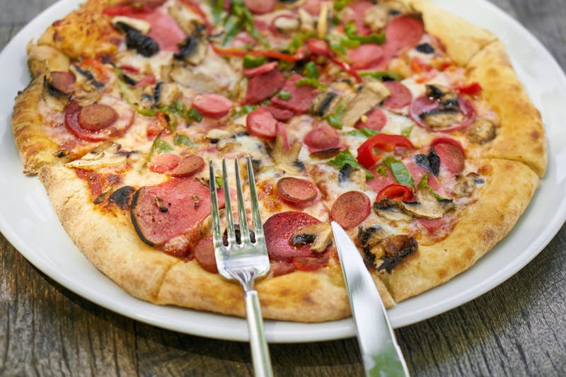 Pepperoni supreme pizza loaded with toppings